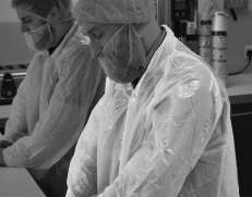 Kertakäyttö suojatakki valkoinen